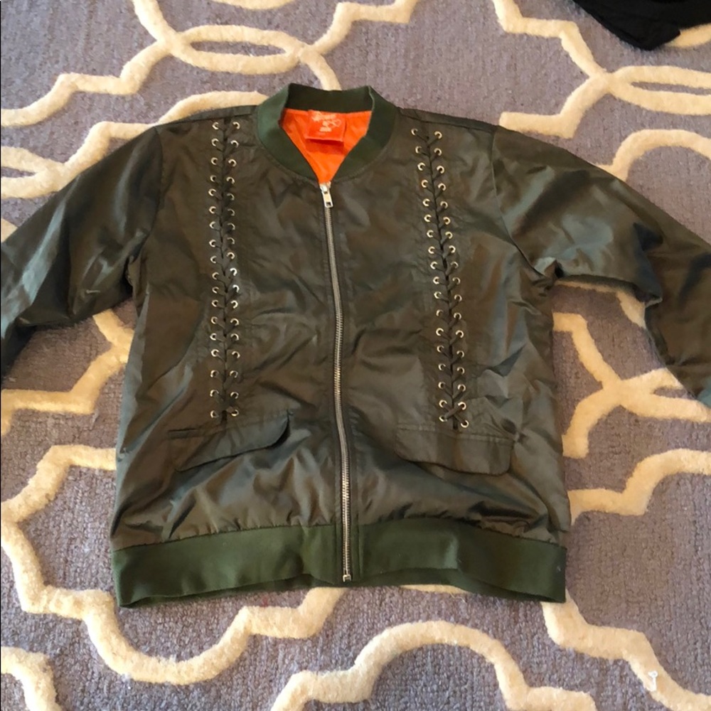 A green zip up jacket size extra large.